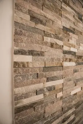 a wall made out of brick at Trevi & Pantheon Luxury Rooms in Rome