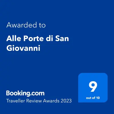 a screenshot of a cell phone with the text awarded to all porrite dh am at B&B Alle Porte di San Giovanni in Rome