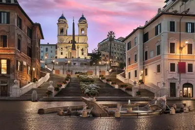 a group of stairs in a city with a church at Torretta Luxury Attico in Rome
