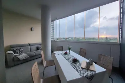 a living room with a table and a couch at Annasole's flat by Domus&Dimore in Rome