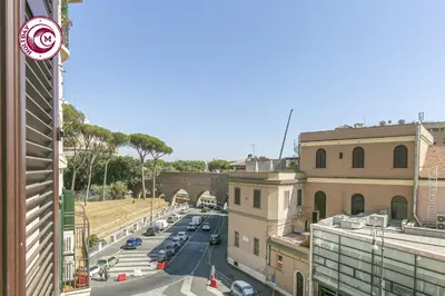 a view of a city street with cars on the road at C M Civitas Leonina Luxury in Rome
