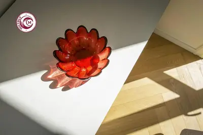 a bowl of fruit sitting on the floor in a room at C M Civitas Leonina Luxury in Rome
