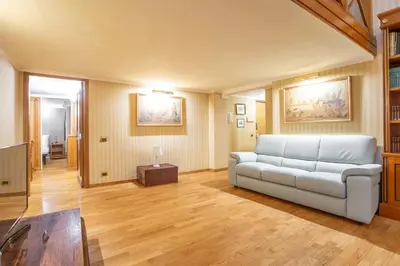 a living room with a couch and a table at Easybnb - Bear Home in Rome