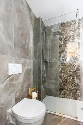 a bathroom with a toilet and a shower at Arya Roma San Pietro in Rome
