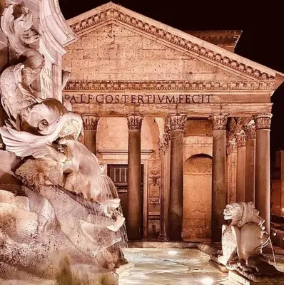 a statue in front of a building with a fountain at Vatican Loft - Liberty Collection in Rome