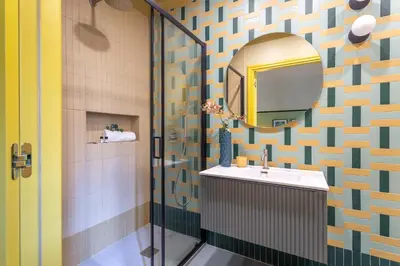 a bathroom with a sink and a mirror at iFlat Colorful New Apartment in Esquilino in Rome