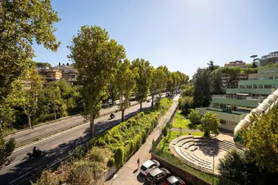 an overhead view of a city street with trees and cars at Apartment Valle Aurelia Metro in Rome