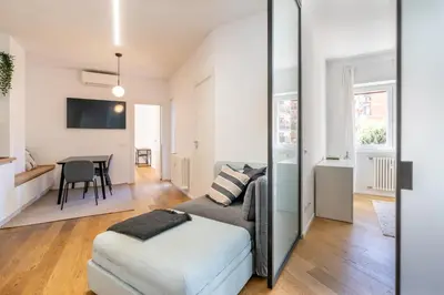 a living room with a couch and a table at Apartment Valle Aurelia Metro in Rome