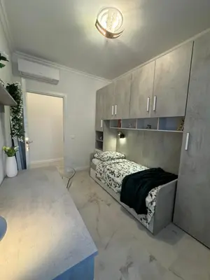 a room with a bed in the middle of it at Casa Giulia in Rome