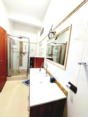 a bathroom with a sink and a shower at Trastevere in Station in Rome