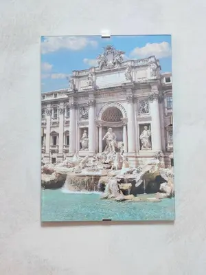 a picture of the trevi fountain in front of a building at Trastevere in Station in Rome