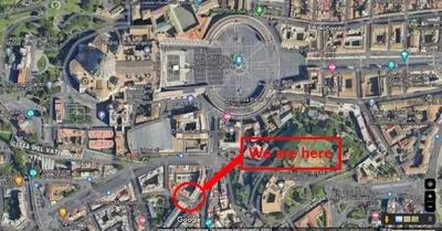 a red sign that says we are here on a map at Saint Peter Apartment in Rome