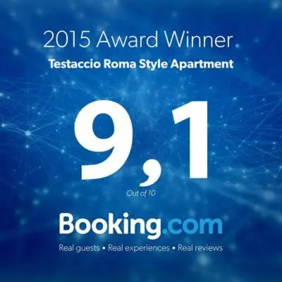 a large building with a pyramid in front of it at Testaccio Roma Style Apartment in Rome