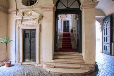 a hallway of a building with a stairway at Il sogno delle tartarughe in Rome
