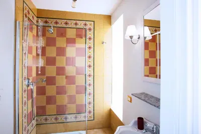 a bathroom with a shower and a sink at Il sogno delle tartarughe in Rome