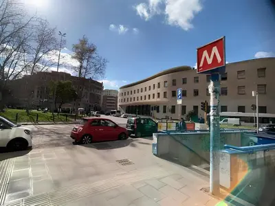 a rendering of a building with a university sign on it at Alis Laura - 10 mins to Colosseum, Modern & Near Metro in Rome