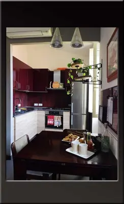 a kitchen with a table with food on it at B&B Garbatella-Sotto l'arco del Lotto 28 in Rome