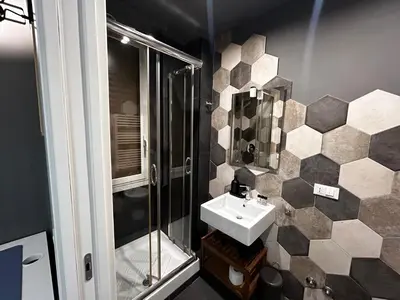 a bathroom with a sink and a shower at Provincie 55 in Rome