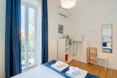 a bedroom with a bed and a window at Elegante Appartamento presso Vaticano in Rome