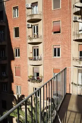 an apartment building with a balcony in front of it at The Twenty - Mazzini apartment in Rome