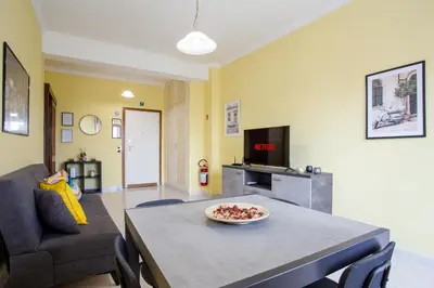a living room with a table with a bowl on it at Your Whole Suite in Rome