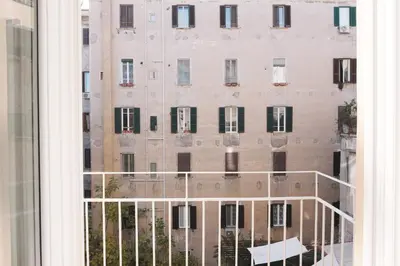 an open window with a view of a building at Numi B&B in Rome