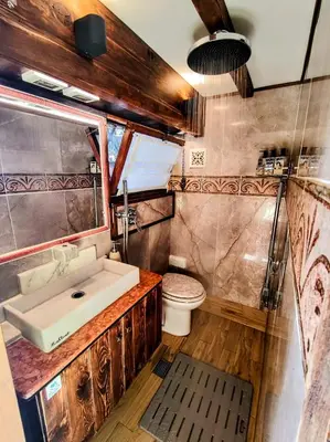 a bathroom with a sink and a toilet at Domus Corneliæ - Romantico Attico Roman & Jacuzzi - Metro A Cornelia in Rome