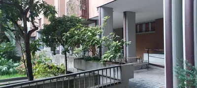 a balcony of a building with trees and plants at AugustoVera19 Tourist Accommodation in Rome