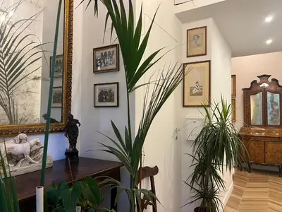 a room with potted plants on the walls at Belle Arti Home in Rome