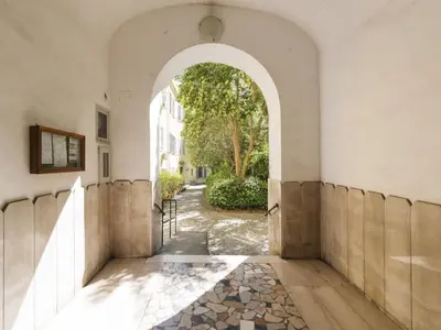 an archway in a building with a stone pathway at Apartment Marsicum by Interhome in Rome