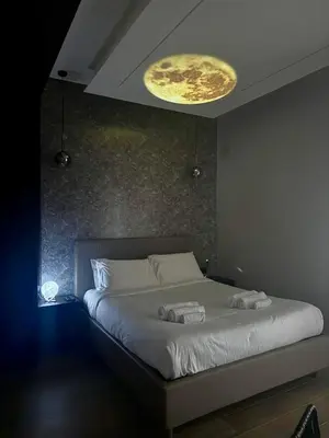 a bathroom with a sink and a shower at Eterna Suites Roma in Rome