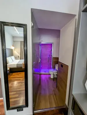 a bathroom with a shower and a toilet in a room at Affittacamere RFI in Rome