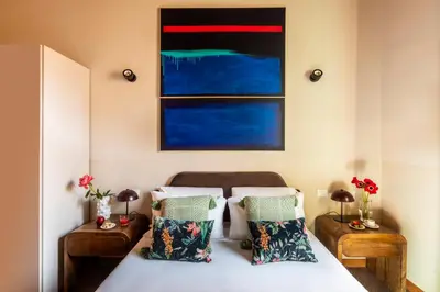 a bedroom with a bed and a window at ROMAC Baullari III - Family apartment in Campo de Fiori in Rome