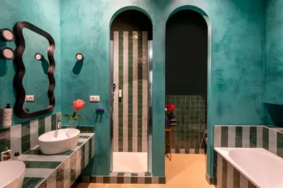 a bathroom with two sinks and a tub at ROMAC Baullari III - Family apartment in Campo de Fiori in Rome