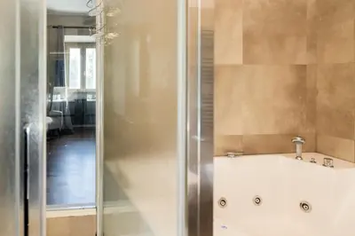 a bathroom with a shower and a sink at Caffarella Suite in Rome