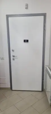 a glass door with a metal frame in a room at Caffarella Garden and Park Apartment in Rome