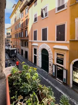 a view of a city street with buildings and plants at Stelletta Apartment in Rome
