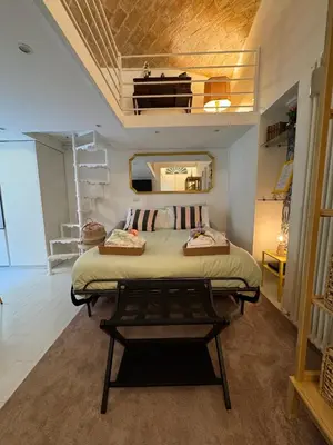 a bedroom with a large bed in a room at Hestya Domus in Rome