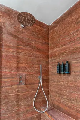 a corner of a room with a wooden wall at AGH - Capranica in Rome