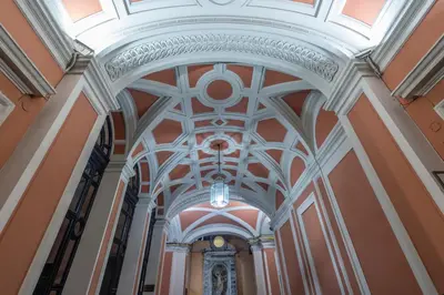a hallway in a building with a vaulted ceiling at Spagna Suite Luxury Home - Trevi Fountain in Rome