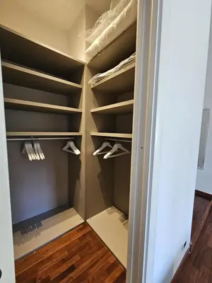 a walk in closet in a house at A Casa di Luca in Rome