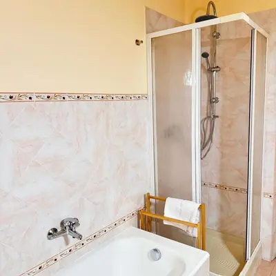 a bathroom with a shower and a sink at Angelico Home in Rome