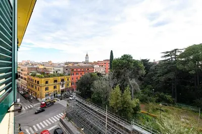 a view of a city with buildings and a street at Casa Vacanze Marrucini in Rome