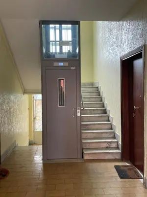 an empty hallway with a door to a room at Fabio´s Holiday House in Rome