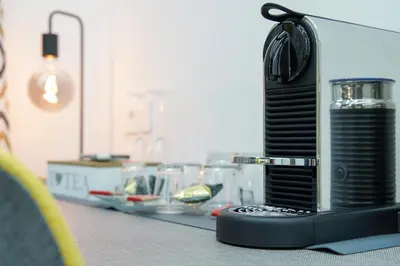 a appliance sitting on top of a counter at New Luxury Rooms in Rome