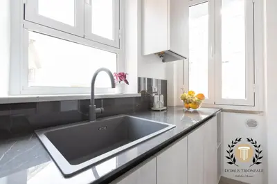 a kitchen with a sink and a window at Domus Trionfale - 8 min walk to Vatican, 500mt to Metro A, A-C in Rome