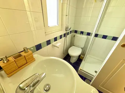 a bathroom with a sink and a toilet and a shower at Living Rome Flaminio - Appartamento parziale - Alloggio ad uso turistico in Rome