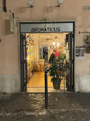 an entrance to a store with a sign on the door at Tata Home Monti in Rome
