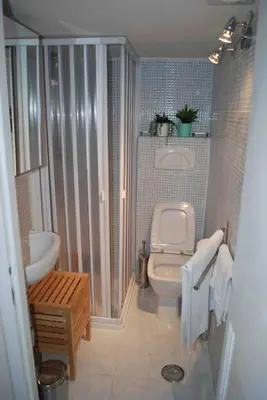 a small bathroom with a toilet and a sink at Affitti brevi Colosseo 2 in Rome