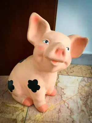 a toy pig sitting on a counter top at Camere artistiche in appartamento in Rome